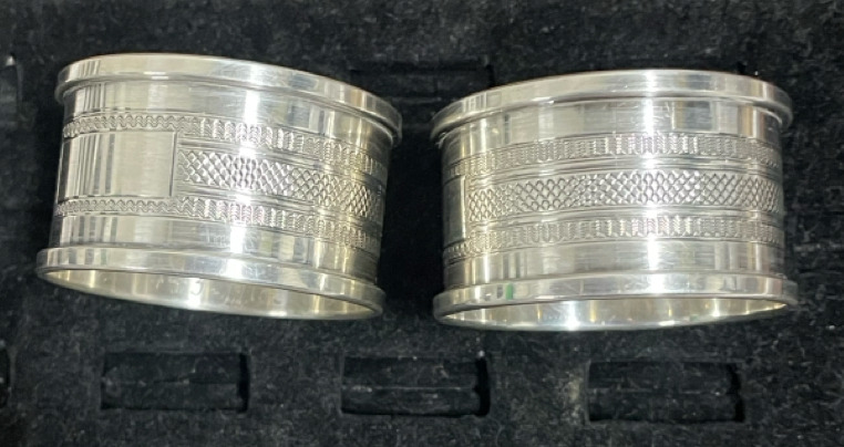 2 English sterling silver napkin rings