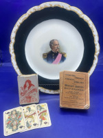 Antique french porcelain portrait plate and antique French playing cards and English French midget series dictionary 1934 edition