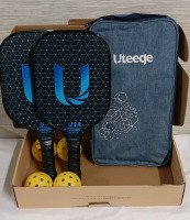 New Uteeque Pickle Balls and Paddles Two paddles 4 balls