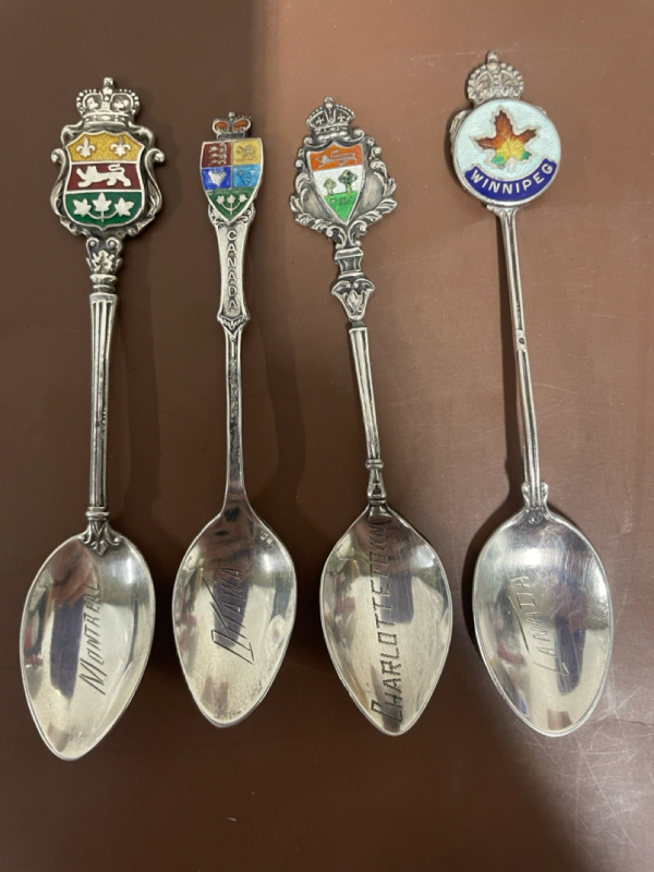 4 Sterling silver souvenir spoons