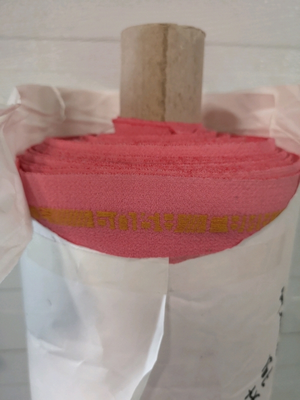 Large Roll of Fabric Pink with Detailing on Edge - 5ft wide