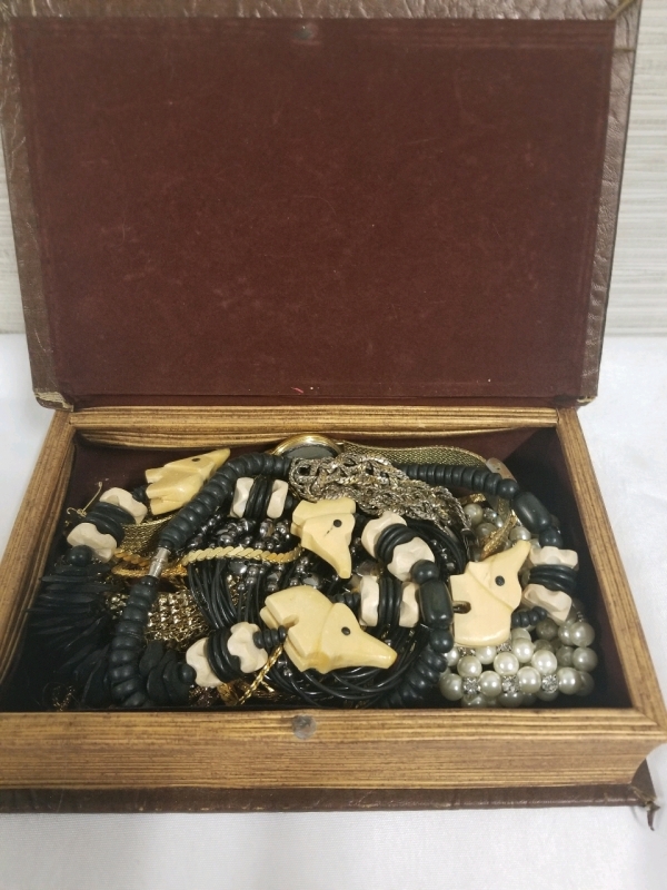 Wooden box full of Jewelry