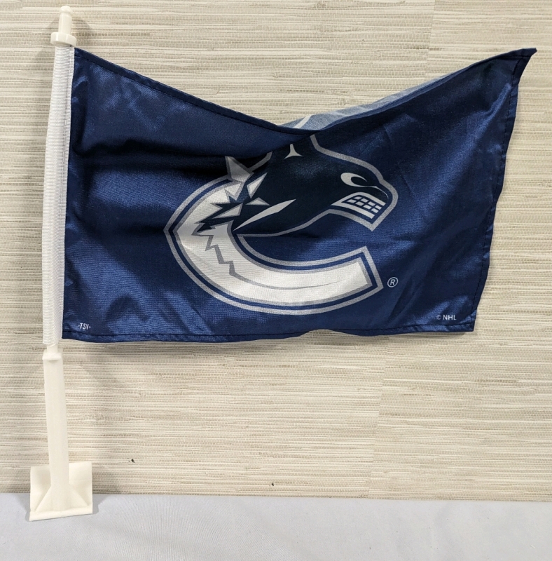 New Vancouver Canucks Car Flag. Pole measures 19.5", flange measures 16.5" by 10"