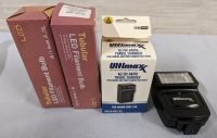 Ultimax Camera Flash and AC/DC Rapid Travel Charger with 2 Tubular Filament Lights.