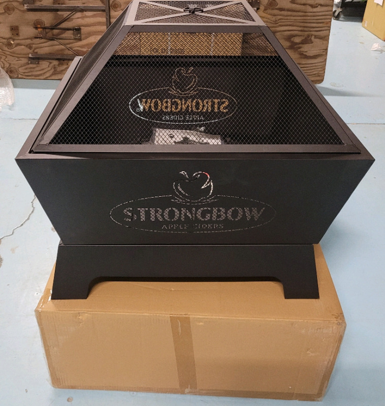 New - Strongbow Apple Cider Outdoor Metal Firepit , measures 26.5"×26.5" & 23" tall