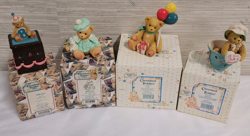 Cherished Teddies Collectables with Boxes . Measures 2 3/4" - 4.5" tall
