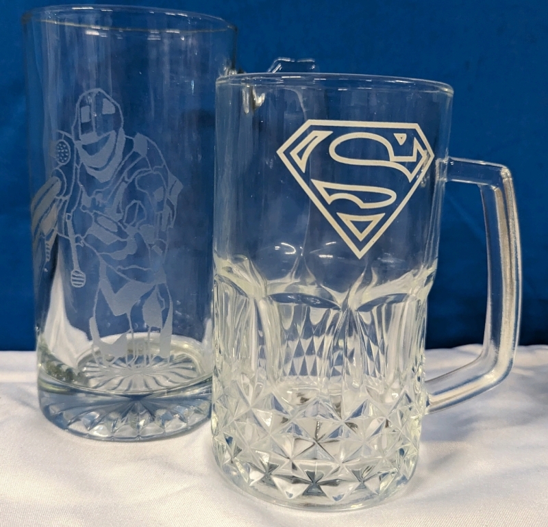 2 Etched Beer Mugs. Tallest Measures 7" Tall