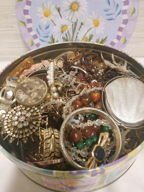 Cookie tin full of vintage to modern jewelry