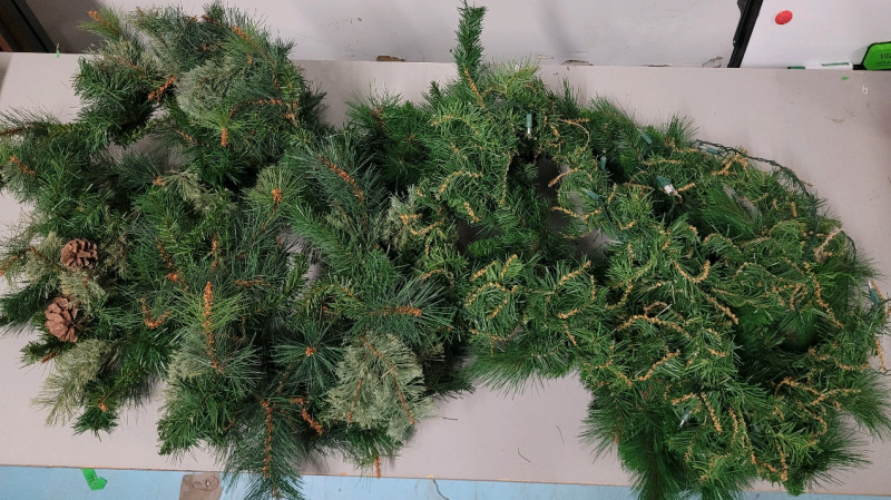 Four (4) 5ft Long Holiday Garland . One (1) Strand Lights-Up