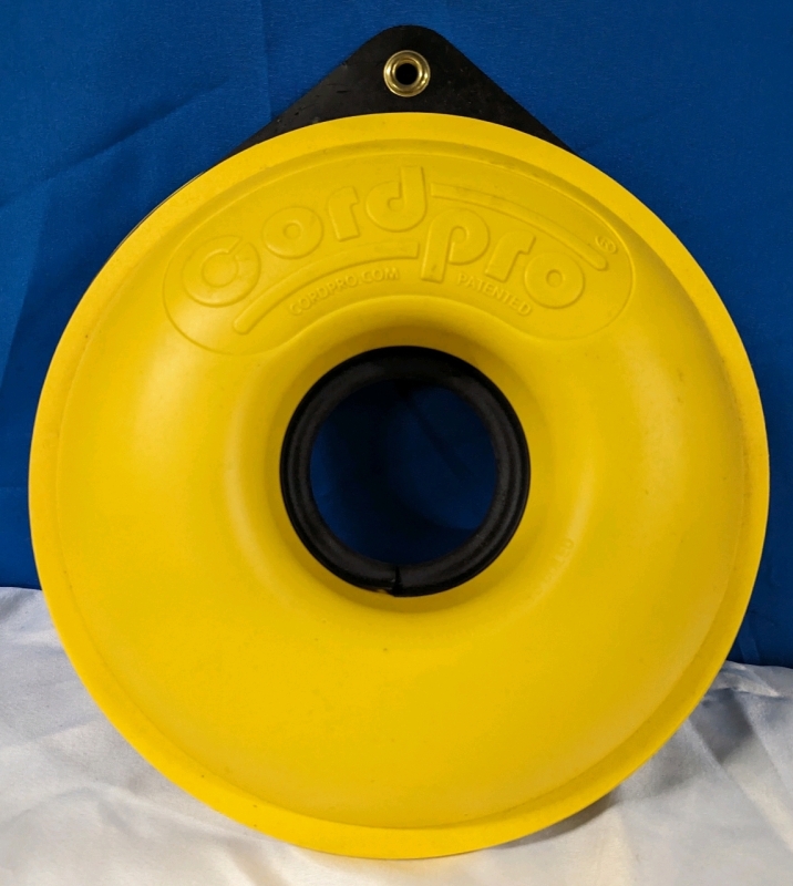 Cord Pro Cord Organizer. 12-5/8” Diameter and 3-7/8” deep.