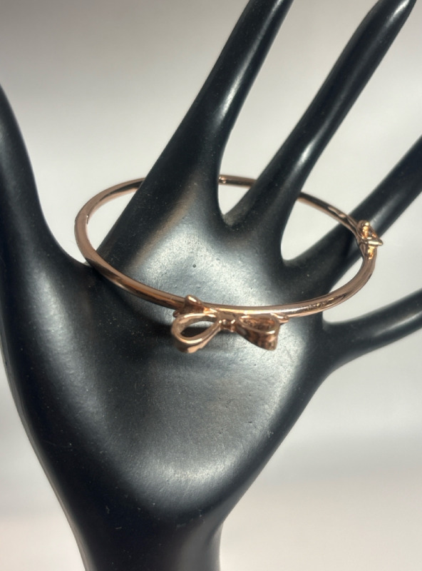 KATE SPADE Rose Gold Tone Bow hinged Bracelet