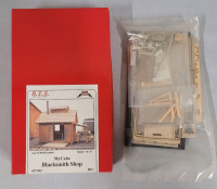 B.T.S. Model Kit : McCabe Blacksmith Shop , HO Scale . Model # 27492 . Some Assembly Required