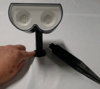 As New Linkind Solar Spot Light with 16 LED. Can go on a building or in the lawn. Stock photos used