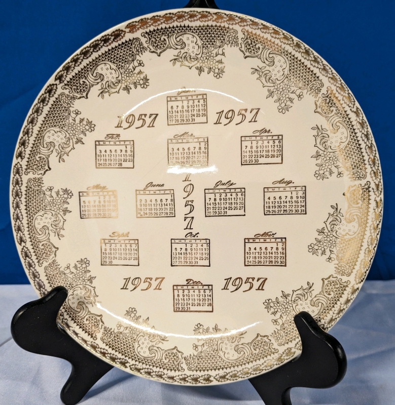 Vintage 1957 Cately's Decorative Calendar Plate. 10.25" Across. Small Hairline Crack on Front