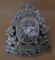 Vintage Timmins Police Department Cap Badge , measures 2 1/4"&times;2.5"