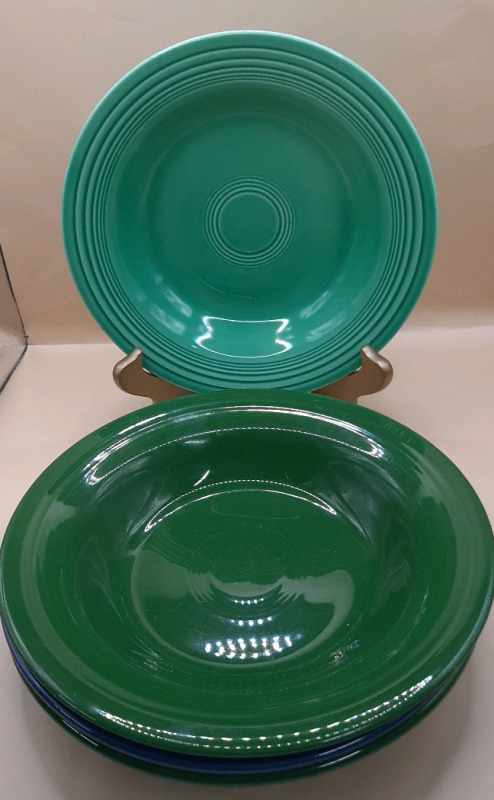 Vintage 4 - 8.25" Fiesta Ware Bowls. All have marks on the back from being hung on the wall