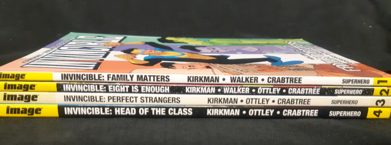 Invincible Volumes 1-4 Paperback Comic Books, 1 First Printing Edition