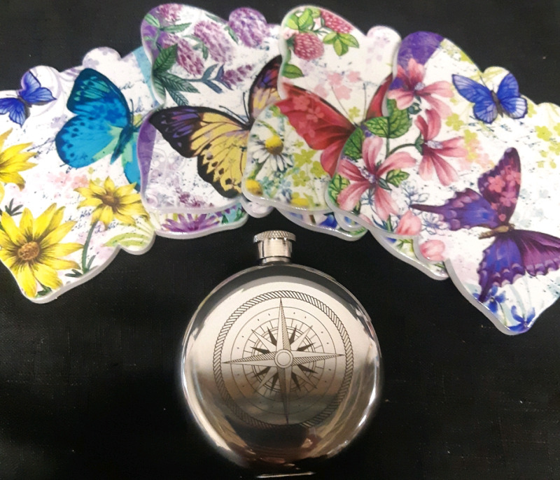 New, 3oz Stainless Steel Compass Flask, and Ceramic Butterfly Coaster set (4)