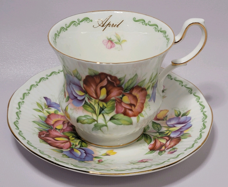 Vintage Queens ' April Sweet Pea ' Cup & Saucer . Both Ring True . No chips or cracks