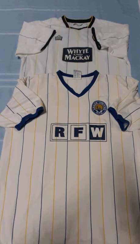 Two Leeds United Football Jerseys The White & Mackay has some staining AND RFW is the Official Retro shirt