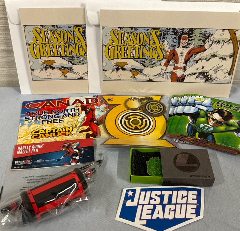 Assorted Superhero Items Including Green Lantern Pin Keychain and Coasters Harley Quinn Mallet Pen Justice Leauge Sticker And Captin Canuck Gretting Cards