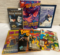 7 Assorted Books Including Marvel & DC 1 Hardcover 6 Paperbacks Batman Superman Spider-Man