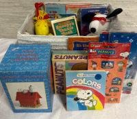 14 Piece Snoopy Lot Including a Doghouse Bank Stickers Books VHS Plush Calendar and Baby Toy