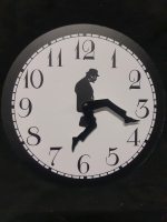 Like New Monty Python Inspired Silly Silent Modern Wall Clock ( 9.5" Diameter )