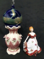 3 Home Decor Pcs, 1 Handblown Glass Cobalt Witch Ball With Green Swirly Pattern, 1 Vintage Porcelain 8" Tall Vase With Rose's, 1 Vintage Victorian Porcelain Lady Figurine With Red White and Gold Dress