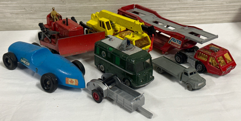 8 Piece Vintage Diecast With a Vintage Boy Scout’s Wood Derby Car Including Dinky Toys / Supertoys Blaw Knox Bulldozer, Tv Roving Eye & Bedford + Matchbox Superkings K-12 Hercules Mobile Crane & K-10 Car Transporter + ERTL Spreader