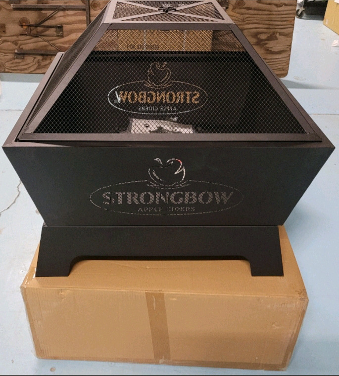 New - Strongbow Apple Cider Outdoor Metal Firepit , measures 26.5"×26.5" & 23" tall