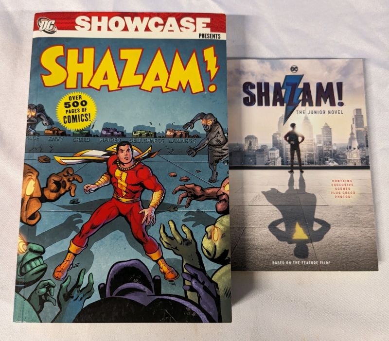 Showcase Presents Shazam! Volume 1 Softcover Comic Anthology and Shazam! Junior Novel. Largest Measures 6.5" by 10.5"