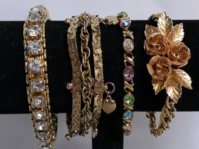 4 Gold-Tone Bracelets