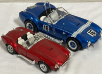 2 Shelby Cobra Diecast Majorette Blue and White Shelby Cobra 427S/C & Red AC Cobra