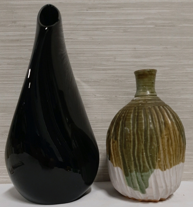 2 Vintage Vases, The Black is 13" Tall with a Chip On The Inside Rim, The Green Shows No Damage & Is Signed