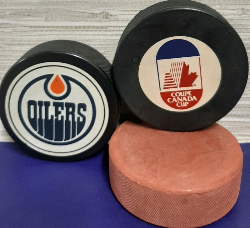 3 Vintage Hockey Pucks Edmonton Oilers, Canada Cup & a Practice Puck