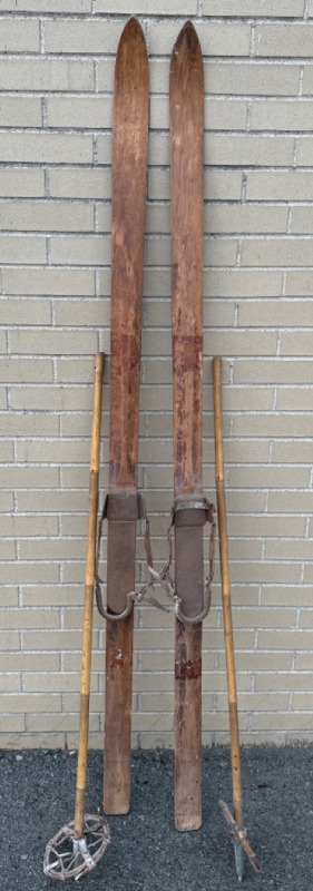 2 Vintage Wood Ski Wall Hangers Approximately 73” With 2 Vintage Bamboo Ski Poles Approximately 47”