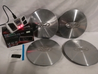 4 Ford Wheel Caps + Sun Visor Bluetooth Car Kit