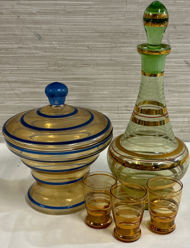 Vintage 4 Piece Bohemian Decanter Genie Bottle with Green Stopper White and Gold Stripes Approximately 10” With 3 2.5” Glasses With a Blue Striped 5.5”D Dish With Lid No Chips