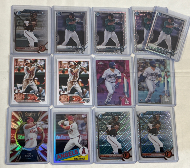 13 MLB Baseball Trading Cards Included 2 Mike Trout Refractors 3 Luis Gonzales Bowman Chrome 1st Mojo Refractors 4 Milkar Perez Bowman Chrome 1st Mojo Refractors 2 Gavin Lux Topps Chrome Rookie Refractors and 2 Gunnar Henderson Topps Rookies