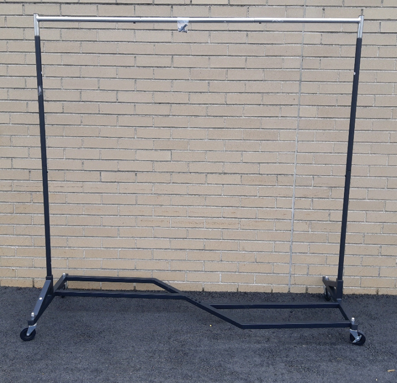 New Assembled Clothing Rack On Wheels 62" Tall 63" Long