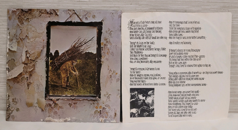 Led Zeppelin IV LP Record . Some Minor Scuffs , Album Cover has Water Damage . Pre-owned