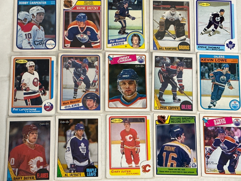 15 Vintage 1982 - 1988 O-Pee-Chee NHL Hockey Trading Cards Including a 1985-86 O-Pee-Chee Wayne Gretzky Scoring Leader #259 OPC Edmonton Oilers