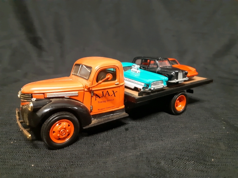 Vintage 1941 Ajax Towing Service Chevrolet Flatbed Truck With A Diecast Cab, 2 Vintage Hotwheels and 1 vintage Corgi Diecast Cars