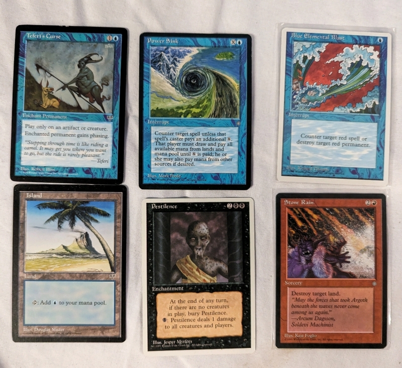 50+ Vintage Magic The Gathering Cards. Includes Ice Age, Antiquities, Mirage, Legends and More. Includes Ice Age Mystic Remora.