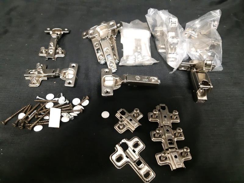 As New lot of Assorted Hinges and Hardware, Lot Includes But Isnt Limited Too Concealed Cabinet Hinges & Soft Close Hinges