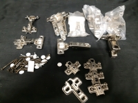 As New lot of Assorted Hinges and Hardware, Lot Includes But Isnt Limited Too Concealed Cabinet Hinges & Soft Close Hinges