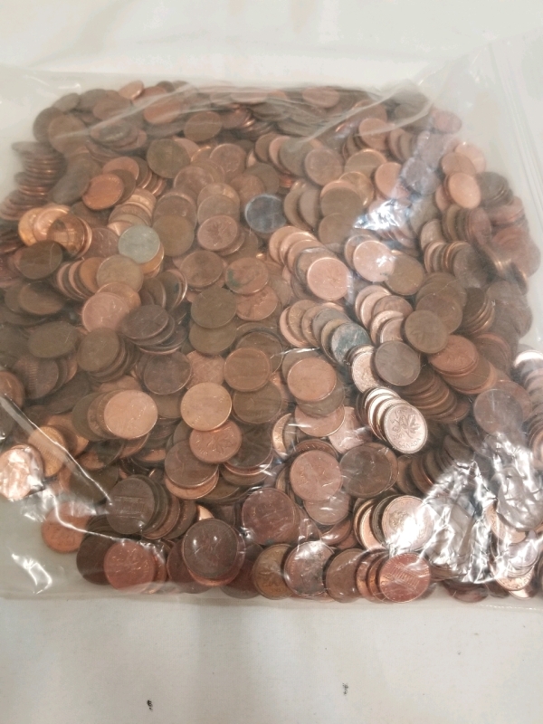 7 plus pounds of Canadian and USA pennies