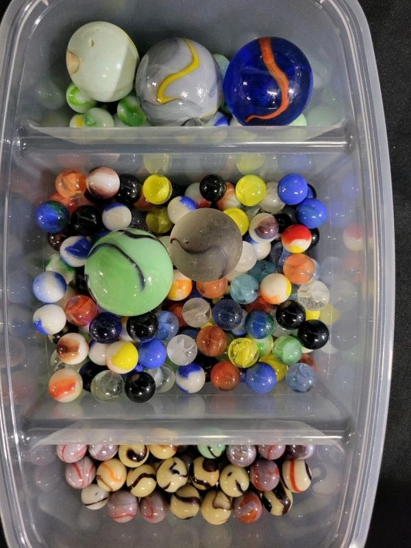 Variety Of Marbles - Container Is 11"x2.5"X5"