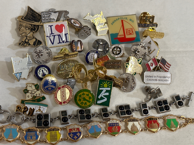 34 Assorted Pins With a 8&rdquo; Myka and World Landmarks Bracelet